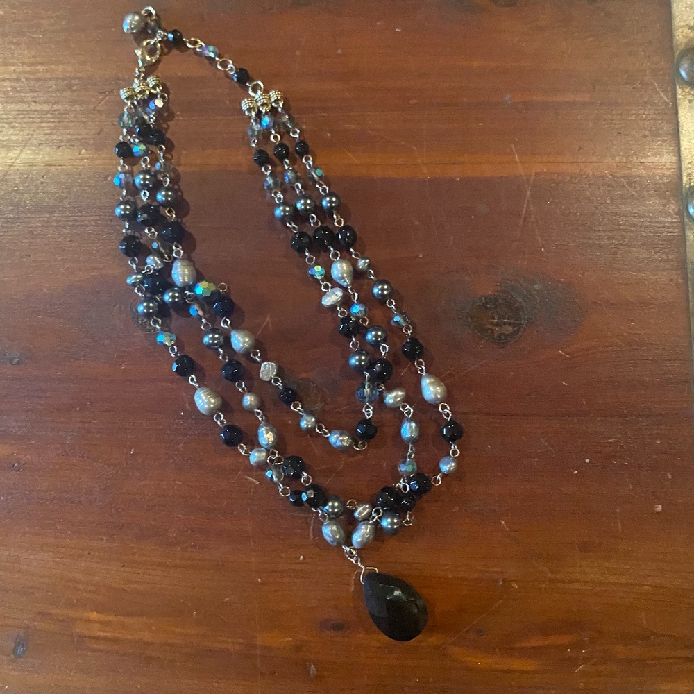 Pretty strand necklace with drop